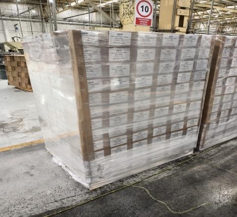 Shrink-wrapped pallet of thermal roll cartons